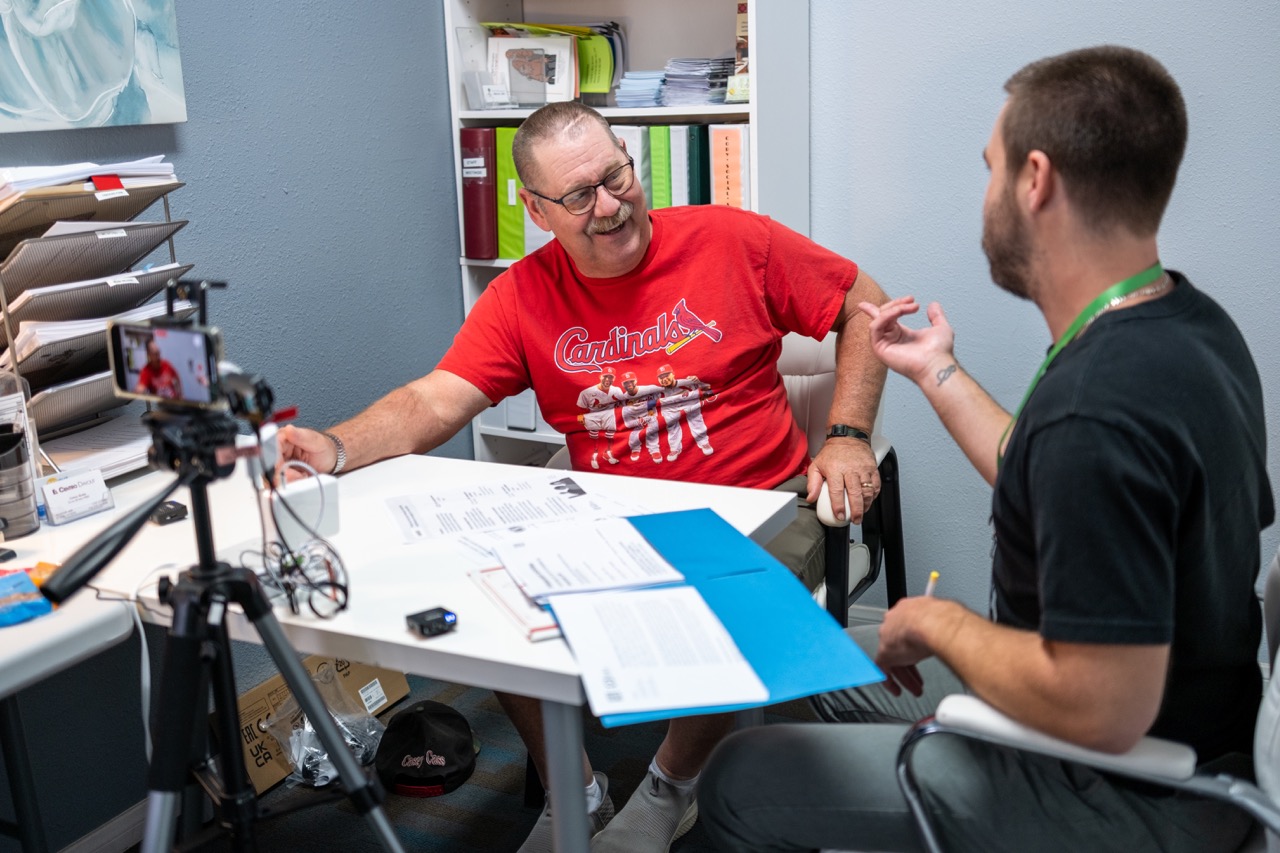 A PPL researcher conducts an interview with an older adult.